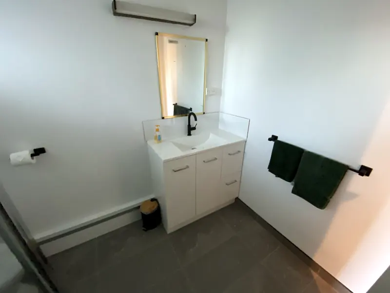 New bathroom vanity with mirror and towel rail